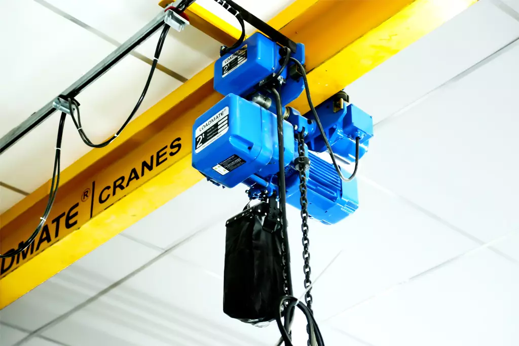 An electric motor is used to hoist building supplies